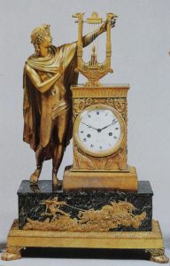 Pendule à l'Apollon en bronze doré et marbre vert de Mer. Claude Galle.Epoque Empire